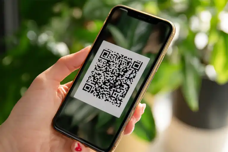 1-ISJ- What is a Digital ID? Phone Dislaying Digital ID QR Code